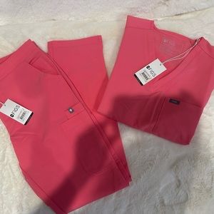 Small pink highlighter one pocket scrub top with matching small scrub pants